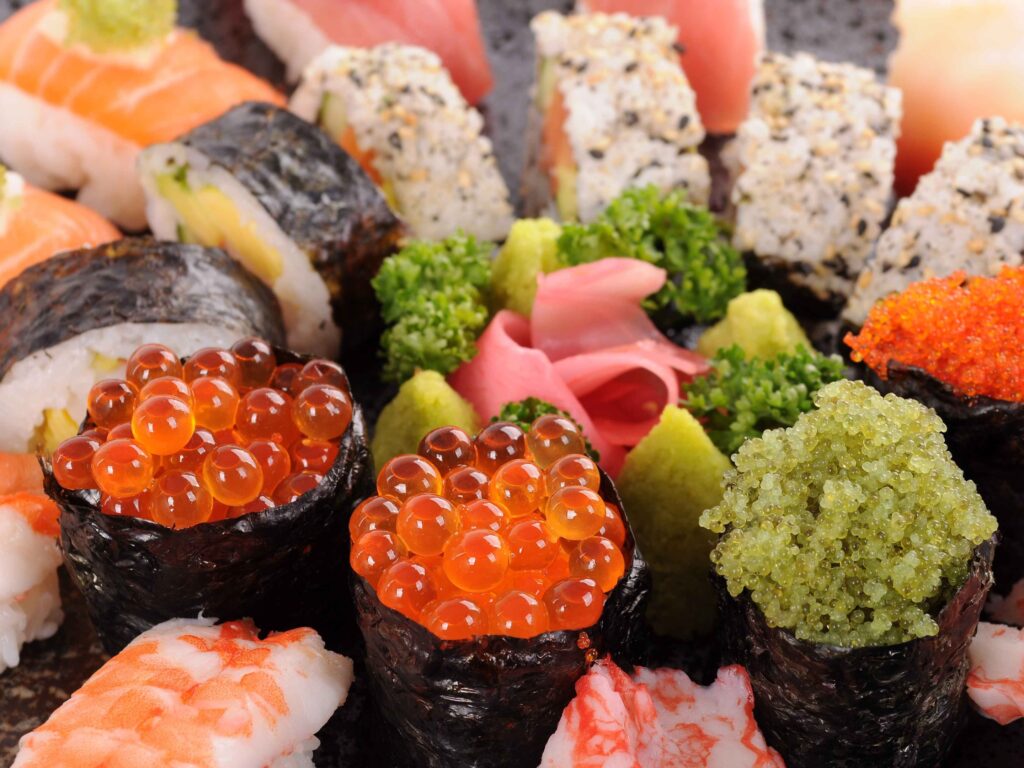 An assortment of different sushi that caters to all taste buds.