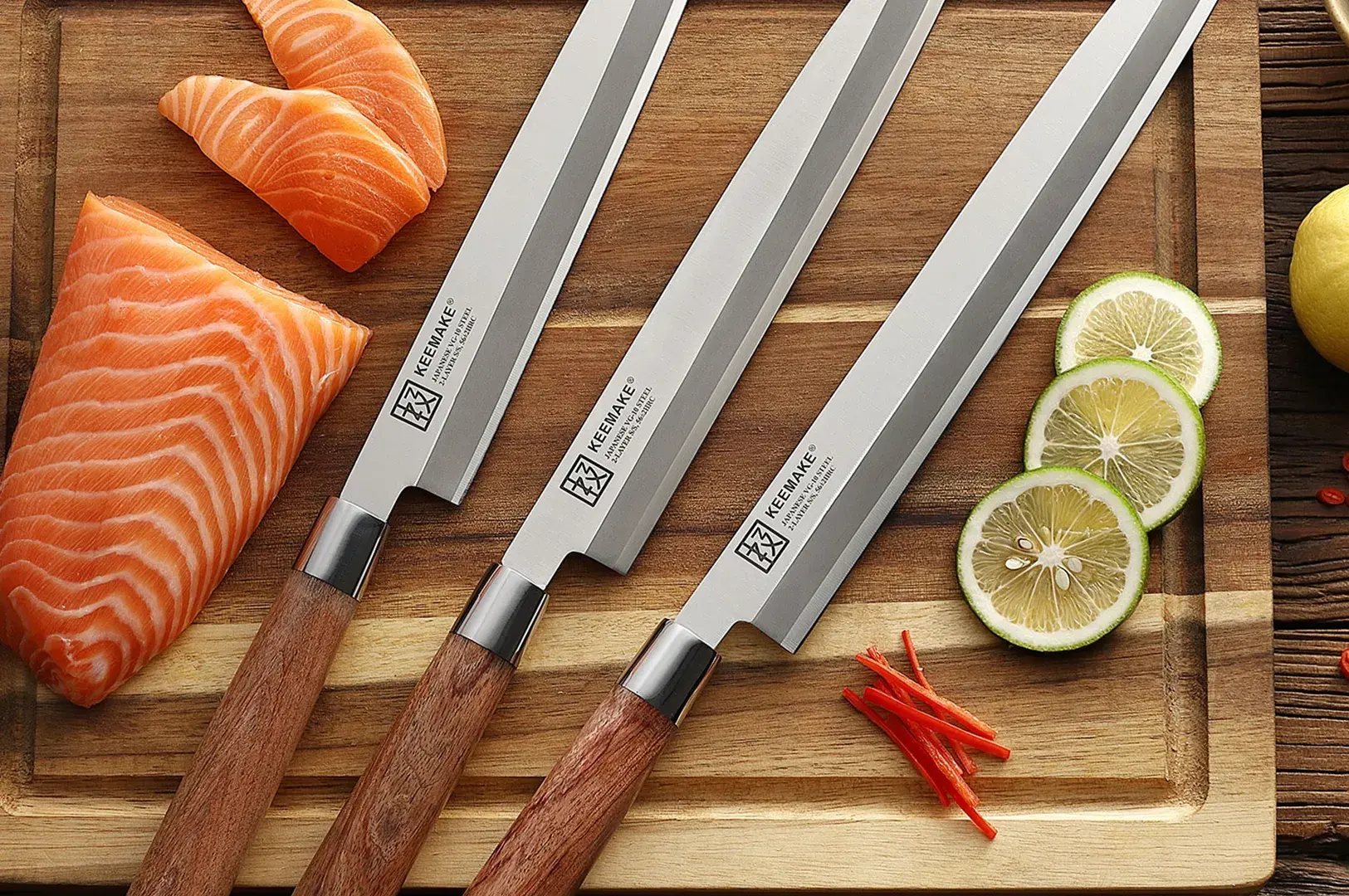 Traditional Japanese sushi knives with fresh salmon on wooden board