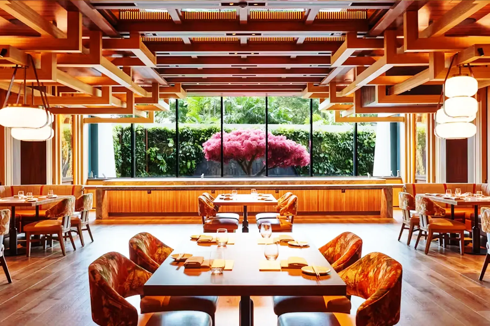 Modern Japanese restaurant interior in Singapore with warm wood design and minimalist dining space