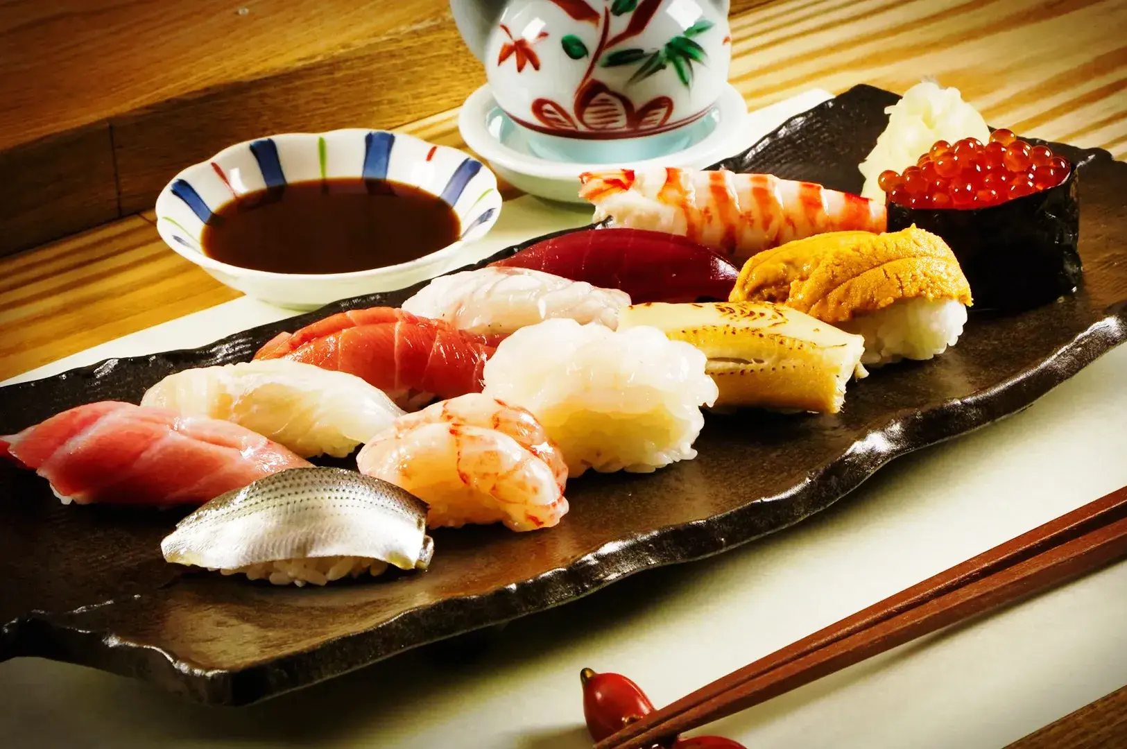 Assorted nigiri sushi platter with fresh seafood served in a Japanese restaurant