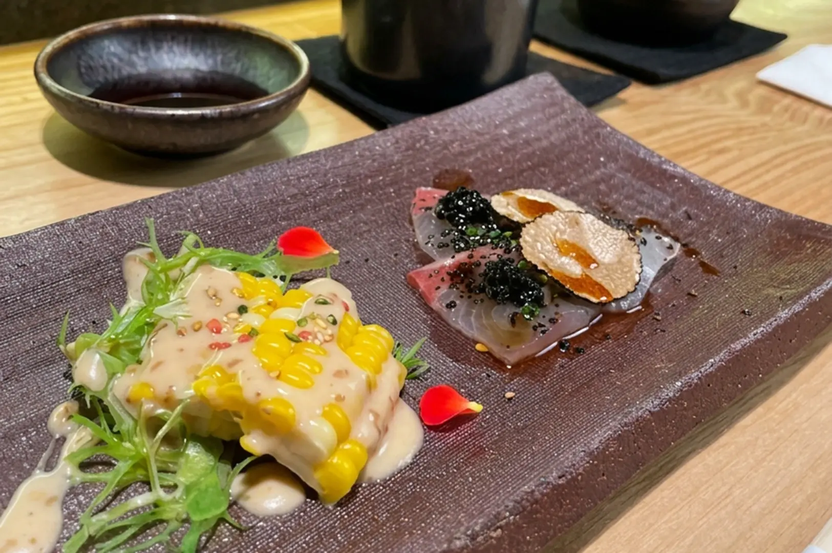 Japanese plated dish with garnishes on ceramic