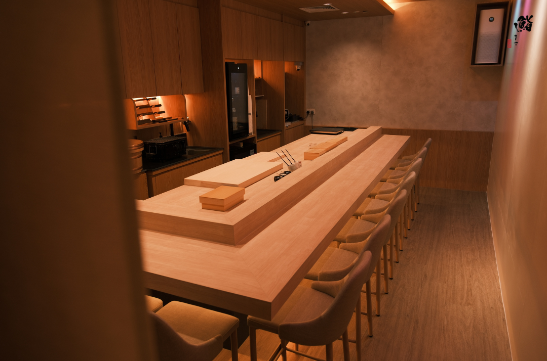 Omakase counter with wooden stools at Sushi Masa by Ki-setsu