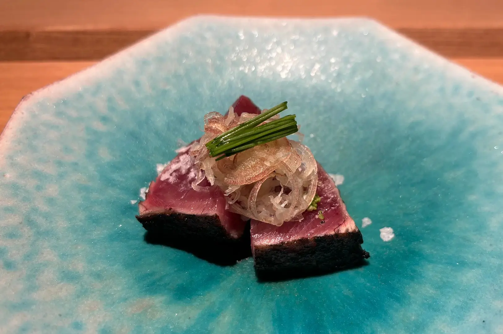 Seared tuna on nori with garnish