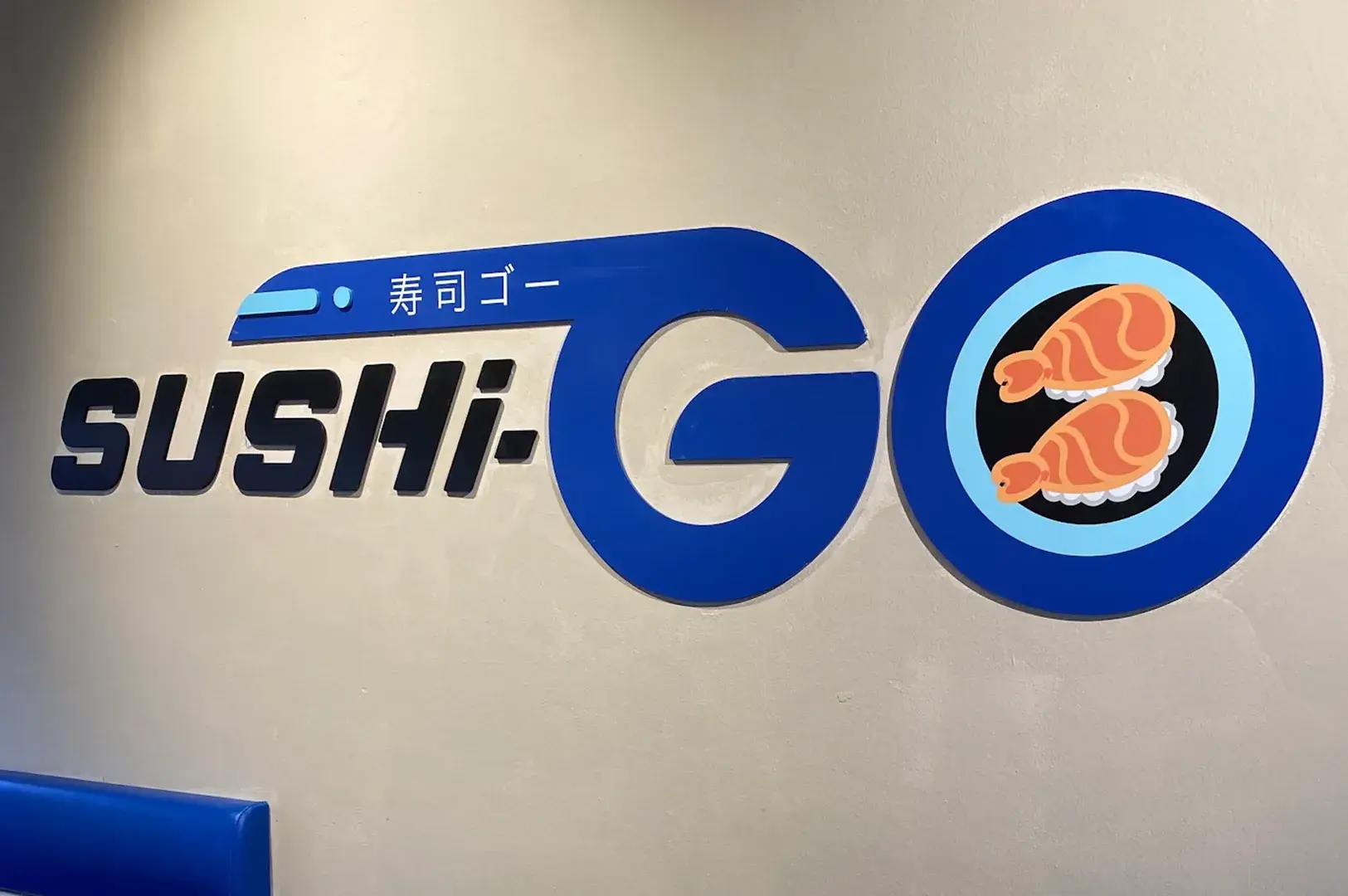 Sushi-Go wall logo with an illustration of salmon sushi.
